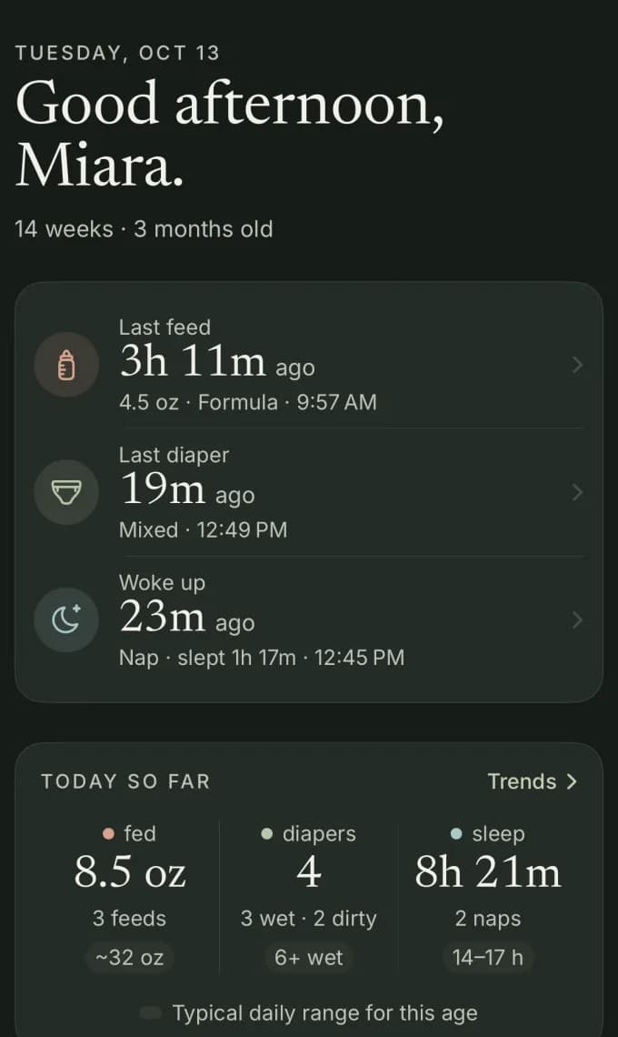 The MiaraOS Today screen in dark mode: time since the last feed, diaper and wake-up, with today's totals beside the typical range for age