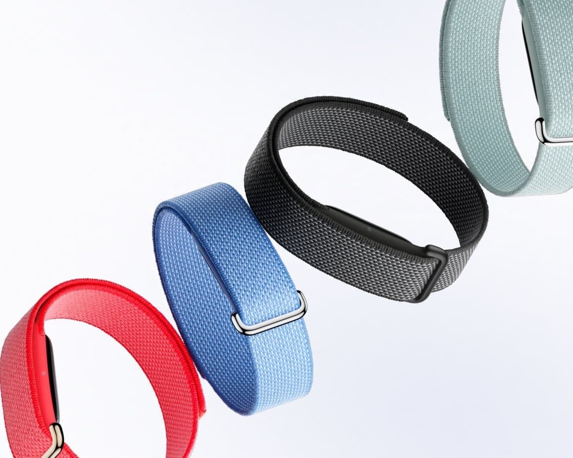 Fitbit Air bands in red, blue, black and sage floating in a diagonal line